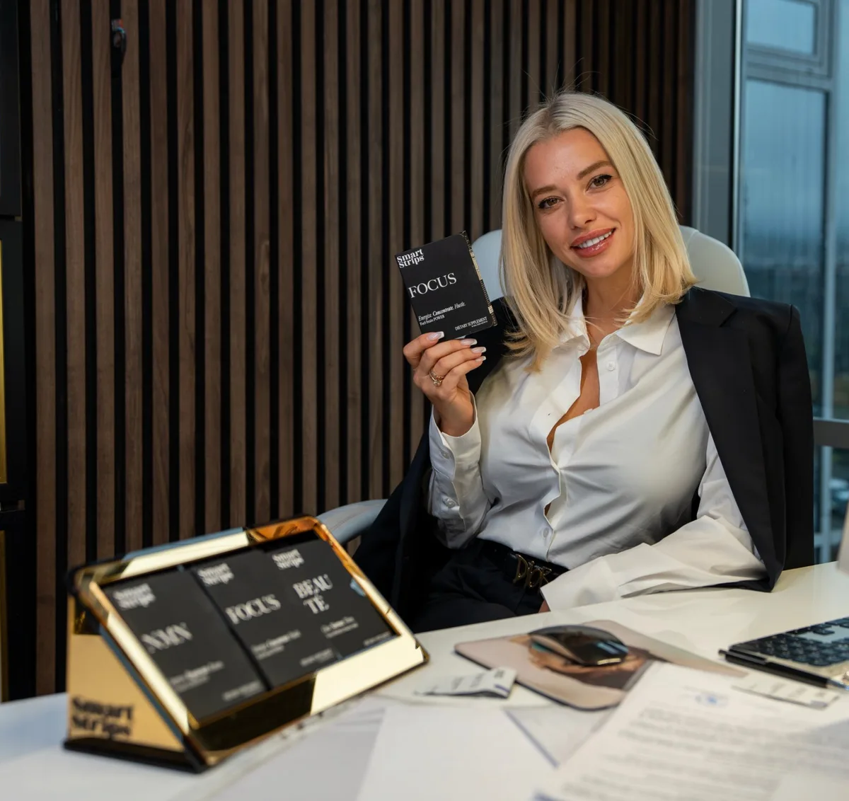 Elina Ivanova-Atanassov at her desk with Smart Strips