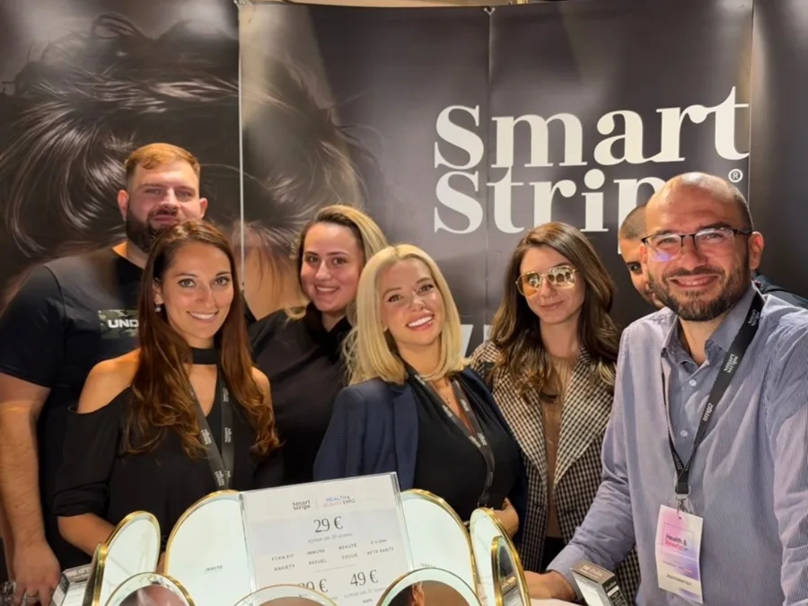 Elina Ivanova-Atanassov with the Smart Strips team at the expo